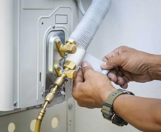 a person fixing a machine