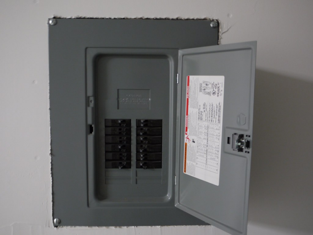 Open electrical circuit breaker panel.