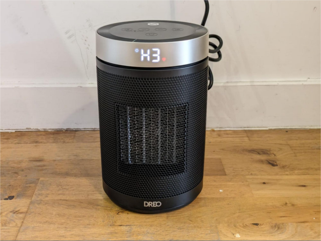 Black portable heater with digital display.