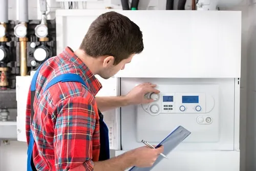 A person doing Heater-Maintenance