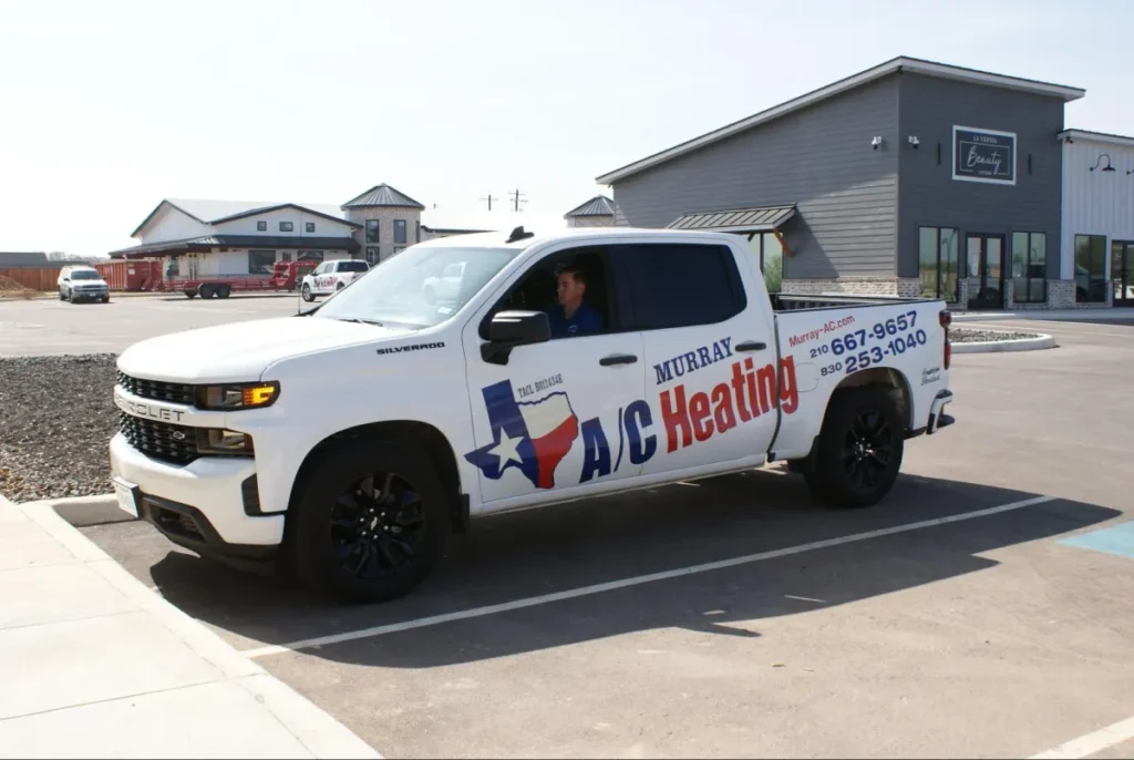 Chevrolet truck with HVAC service branding