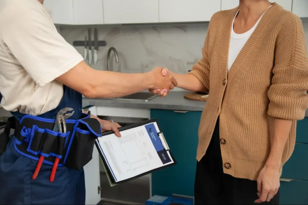 Murray AC technician completing successful air conditioning service appointment