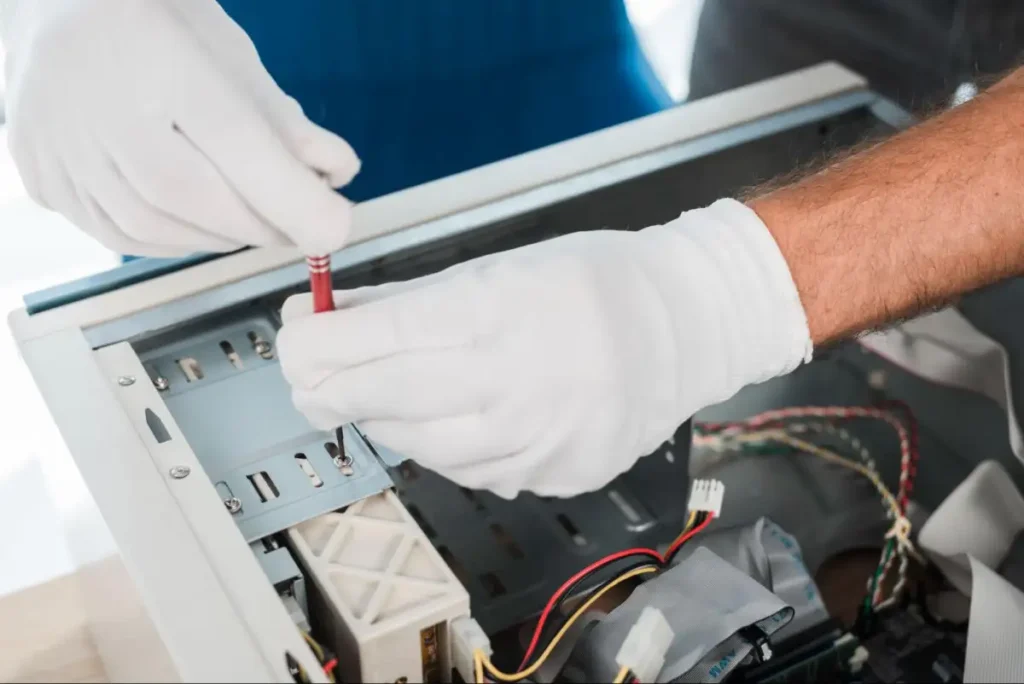 HVAC expert servicing indoor air conditioning system components