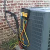 a air conditioner with wires attached to it